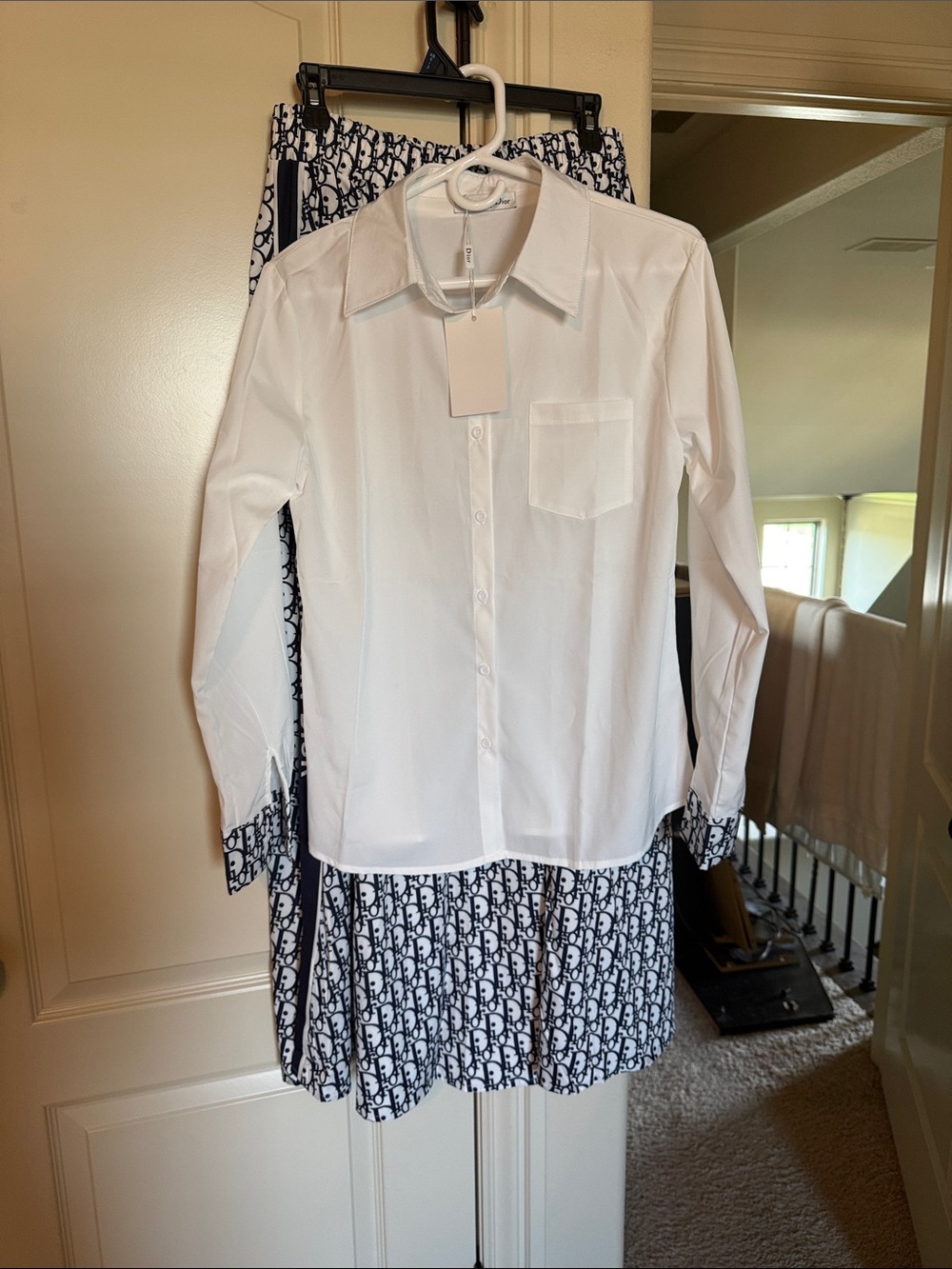 Uniqlo White Button-Down Shirt with Navy Patterned Maxi Skirt